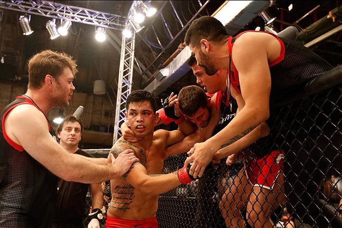 BUENOS AIRES, ARGENTINA - MAY 20: Pablo Sabori celebrates his submission victory over Santiago Cardenas with his team during the filming of The Ultimate Fighter Latin America: Team Liddell vs Team Griffin on May 20, 2016 in Buenos Aires, Argentina. (Phot