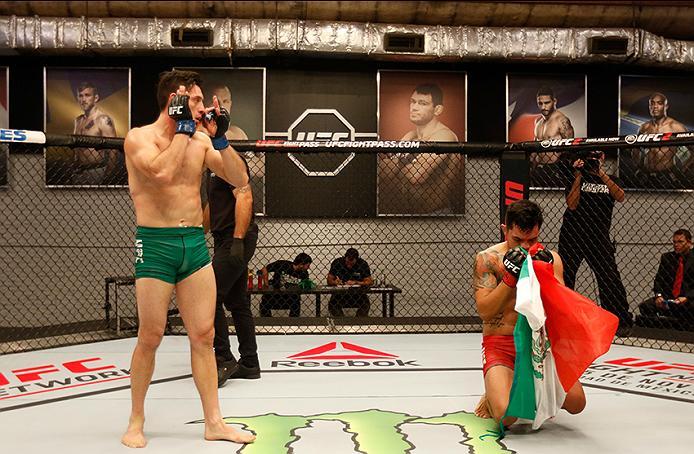 BUENOS AIRES, ARGENTINA - MAY 20:  (R-L) Pablo Sabori celebrates his submission victory over Santiago Cardenas during the filming of The Ultimate Fighter Latin America: Team Liddell vs Team Griffin on May 20, 2016 in Buenos Aires, Argentina. (Photo by Gab