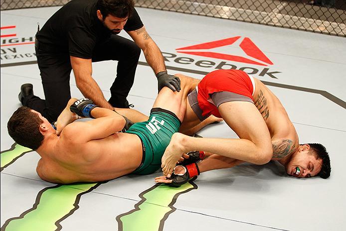 BUENOS AIRES, ARGENTINA - JUNE 3: (L-R) Claudio Puelles submits Pablo Sabori during the filming of The Ultimate Fighter Latin America: Team Liddell vs Team Griffin on June 3, 2016 in Buenos Aires, Argentina. (Photo by Gabriel Rossi/Zuffa LLC/Zuffa LLC vi