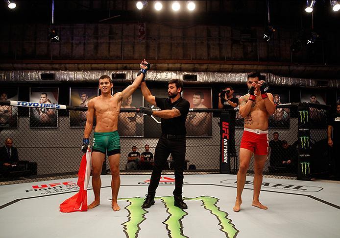 BUENOS AIRES, ARGENTINA - JUNE 3: (L-R) Claudio Puelles celebrates his victory over Pablo Sabori during the filming of The Ultimate Fighter Latin America: Team Liddell vs Team Griffin on June 3, 2016 in Buenos Aires, Argentina. (Photo by Gabriel Rossi/Zu