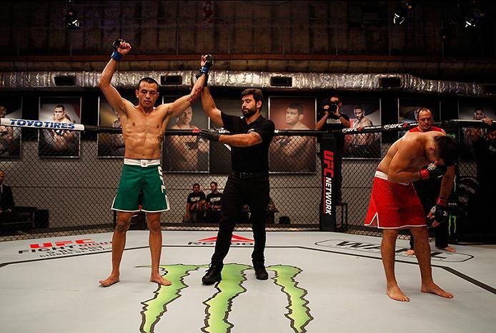 BUENOS AIRES, ARGENTINA - JUNE 3: (L-R) Leonardo Rodriguez celebrates his victory over Walter Zamora during the filming of The Ultimate Fighter Latin America: Team Liddell vs Team Griffin on June 3, 2016 in Buenos Aires, Argentina. (Photo by Gabriel Ross