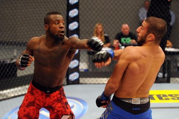 LAS VEGAS, NV - MAY 29:  Chris Beal (L) punches Sirwan Kakai in their elimination fight during filming of season eighteen of The Ultimate Fighter on May 29, 2013 in Las Vegas, Nevada. (Photo by Al Powers/Zuffa LLC/Zuffa LLC via Getty Images) 