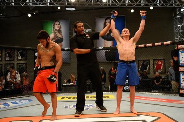 LAS VEGAS, NV - MAY 29:  David Grant (R) celebrates after defeating Danny Martinez in their elimination fight during filming of season eighteen of The Ultimate Fighter on May 29, 2013 in Las Vegas, Nevada. (Photo by Al Powers/Zuffa LLC/Zuffa LLC via Getty