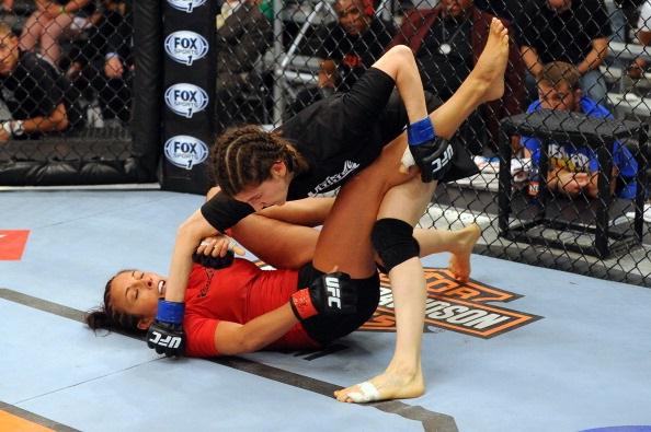 LAS VEGAS, NV - MAY 29: Roxanne Modafferi (R) punches Valeri Letourneau in their elimination fight during filming of season eighteen of The Ultimate Fighter on May 29, 2013 in Las Vegas, Nevada. (Photo by Al Powers/Zuffa LLC/Zuffa LLC via Getty Images)