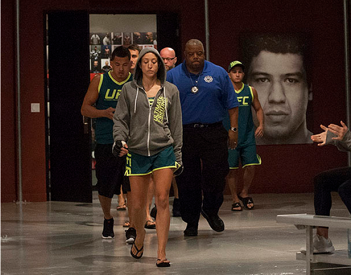 LAS VEGAS, NV - JULY 15: Team Pettis fighter Jessica Penne prepares to enter the Octagon before facing team Melendez fighter Lisa Ellis during filming of season twenty of The Ultimate Fighter on July 15, 2014 in Las Vegas, Nevada. (Photo by Brandon Magnu