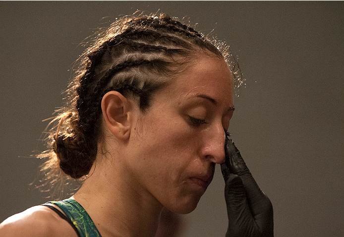 LAS VEGAS, NV - JULY 15: Team Pettis fighter Jessica Penne prepares to enter the Octagon before facing team Melendez fighter Lisa Ellis during filming of season twenty of The Ultimate Fighter on July 15, 2014 in Las Vegas, Nevada. (Photo by Brandon Magnu