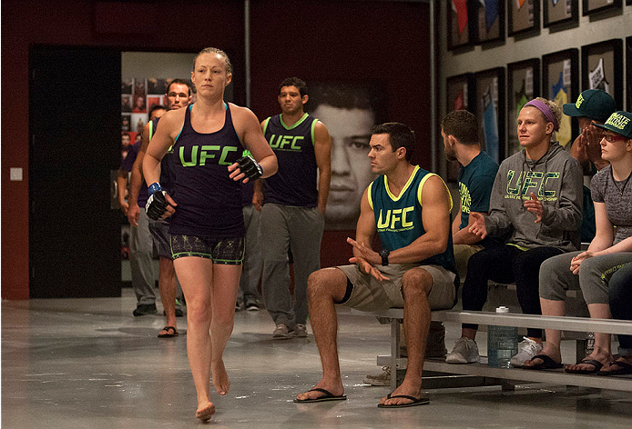 LAS VEGAS, NV - JULY 15: Team Melendez fighter Lisa Ellis prepares to enter the Octagon before facing team Pettis fighter Jessica Penne during filming of season twenty of The Ultimate Fighter on July 15, 2014 in Las Vegas, Nevada. (Photo by Brandon Magnu