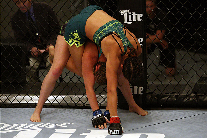 LAS VEGAS, NV - JULY 15:  (Top) Team Pettis fighter Jessica Penne controls the body of team Melendez fighter Lisa Ellis during filming of season twenty of The Ultimate Fighter on July 15, 2014 in Las Vegas, Nevada. (Photo by Brandon Magnus/Zuffa LLC/Zuffa