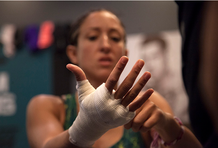 LAS VEGAS, NV - JULY 15:  Team Pettis fighter Jessica Penne gets her hands wrapped before facing team Melendez fighter Lisa Ellis during filming of season twenty of The Ultimate Fighter on July 15, 2014 in Las Vegas, Nevada. (Photo by Brandon Magnus/Zuffa