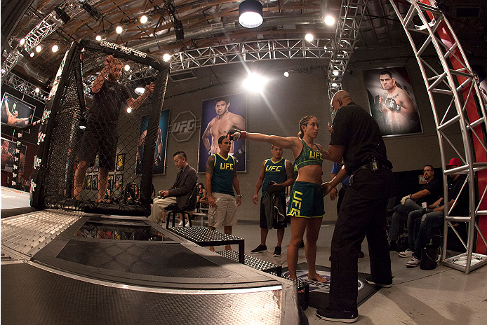 LAS VEGAS, NV - JULY 15: Team Pettis fighter Jessica Penne prepares to enter the Octagon before facing team Melendez fighter Lisa Ellis during filming of season twenty of The Ultimate Fighter on July 15, 2014 in Las Vegas, Nevada. (Photo by Brandon Magnu