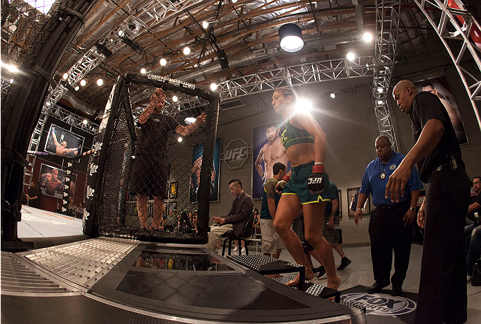 LAS VEGAS, NV - JULY 15: Team Pettis fighter Jessica Penne prepares to enter the Octagon before facing team Melendez fighter Lisa Ellis during filming of season twenty of The Ultimate Fighter on July 15, 2014 in Las Vegas, Nevada. (Photo by Brandon Magnu