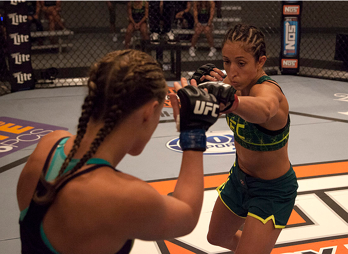 LAS VEGAS, NV - JULY 15: (R-L) Team Pettis fighter Jessica Penne punches team Melendez fighter Lisa Ellis during filming of season twenty of The Ultimate Fighter on July 15, 2014 in Las Vegas, Nevada. (Photo by Brandon Magnus/Zuffa LLC/Zuffa LLC via Gett