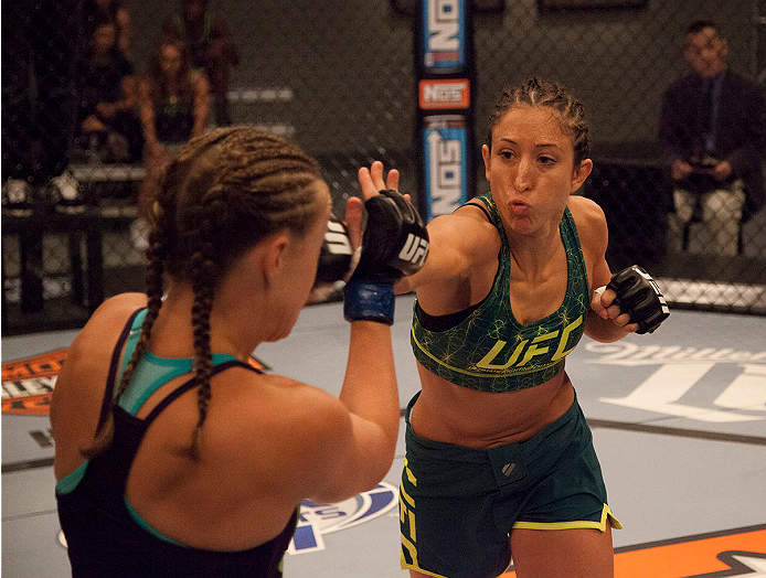 LAS VEGAS, NV - JULY 15:  (R-L) Team Pettis fighter Jessica Penne punches team Melendez fighter Lisa Ellis during filming of season twenty of The Ultimate Fighter on July 15, 2014 in Las Vegas, Nevada. (Photo by Brandon Magnus/Zuffa LLC/Zuffa LLC via Gett