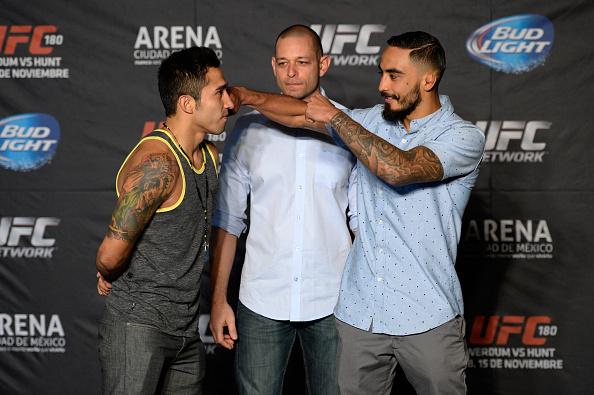 MEXICO CITY, MEXICO - NOVEMBER 13: Alejandro Perez (L) and Jose Quinonez (R) face off during the UFC 180 Ultimate Media Day at the Camino Real Polanco Mexico on November 13, 2014 in Mexico City, Mexico. (Photo by Jeff Bottari/Zuffa LLC/Zuffa LLC via Gett