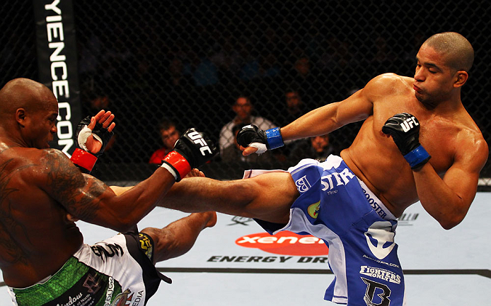 ATLANTA, GA - APRIL 21: Maximo Blanco (R) kicks Marcus Brimage during their featherweight bout for UFC 145 at Philips Arena on April 21, 2012 in Atlanta, Georgia. (Photo by Al Bello/Zuffa LLC/Zuffa LLC via Getty Images)
