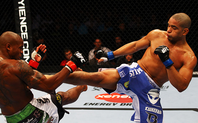 ATLANTA, GA - APRIL 21:  Maximo Blanco (R) kicks Marcus Brimage during their featherweight bout for UFC 145 at Philips Arena on April 21, 2012 in Atlanta, Georgia.  (Photo by Al Bello/Zuffa LLC/Zuffa LLC via Getty Images)