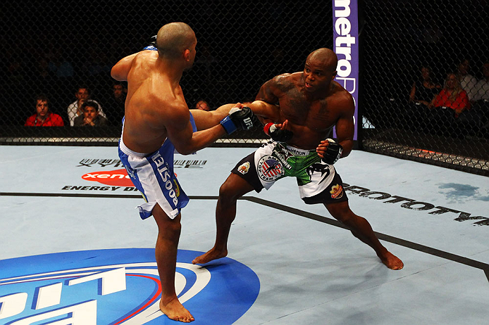 ATLANTA, GA - APRIL 21: Marcus Brimage (R) blocks a kick by Maximo Blanco during their featherweight bout for UFC 145 at Philips Arena on April 21, 2012 in Atlanta, Georgia. (Photo by Al Bello/Zuffa LLC/Zuffa LLC via Getty Images)