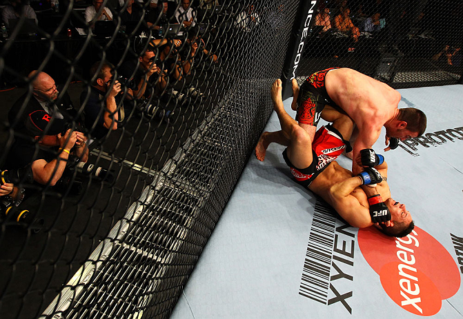 ATLANTA, GA - APRIL 21: Keith Wisniewski (bottom) grapples with Chris Clements during their welterweight bout for UFC 145 at Philips Arena on April 21, 2012 in Atlanta, Georgia. (Photo by Al Bello/Zuffa LLC/Zuffa LLC via Getty Images)