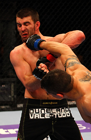 ATLANTA, GA - APRIL 21: Chris Clements (R) punches Keith Wisniewski during their welterweight bout for UFC 145 at Philips Arena on April 21, 2012 in Atlanta, Georgia. (Photo by Al Bello/Zuffa LLC/Zuffa LLC via Getty Images)