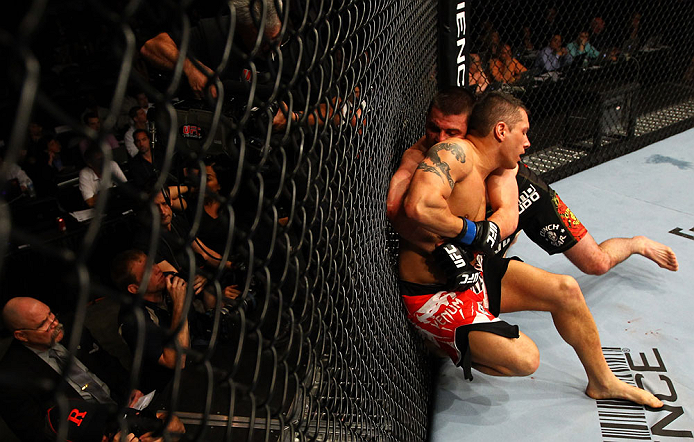 ATLANTA, GA - APRIL 21:  Keith Wisniewski and Chris Clements (front) grapple during their welterweight bout for UFC 145 at Philips Arena on April 21, 2012 in Atlanta, Georgia.  (Photo by Al Bello/Zuffa LLC/Zuffa LLC via Getty Images)