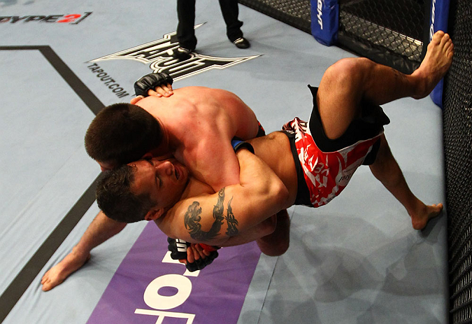 ATLANTA, GA - APRIL 21: Keith Wisniewski and Chris Clements (front) grapple during their welterweight bout for UFC 145 at Philips Arena on April 21, 2012 in Atlanta, Georgia. (Photo by Al Bello/Zuffa LLC/Zuffa LLC via Getty Images)