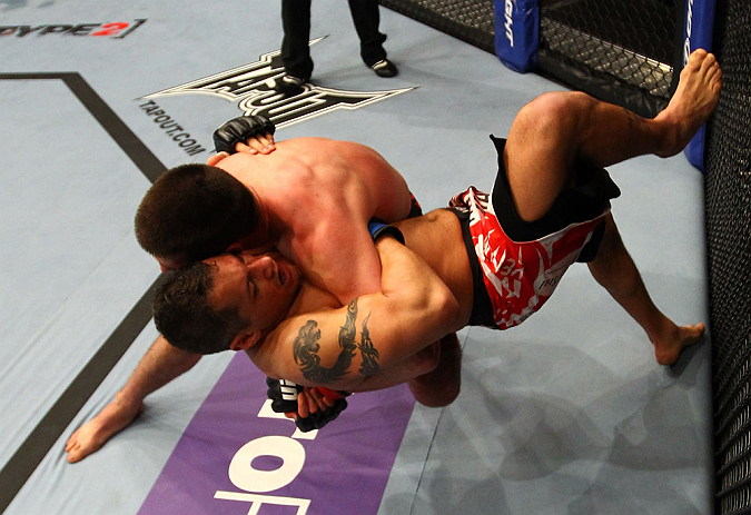 ATLANTA, GA - APRIL 21:  Keith Wisniewski and Chris Clements (front) grapple during their welterweight bout for UFC 145 at Philips Arena on April 21, 2012 in Atlanta, Georgia.  (Photo by Al Bello/Zuffa LLC/Zuffa LLC via Getty Images)