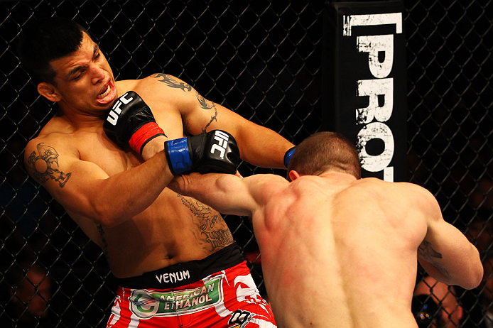 ATLANTA, GA - APRIL 21: Mac Danzig (R) punches Efrain Escudero during their lightweight bout for UFC 145 at Philips Arena on April 21, 2012 in Atlanta, Georgia. (Photo by Al Bello/Zuffa LLC/Zuffa LLC via Getty Images)