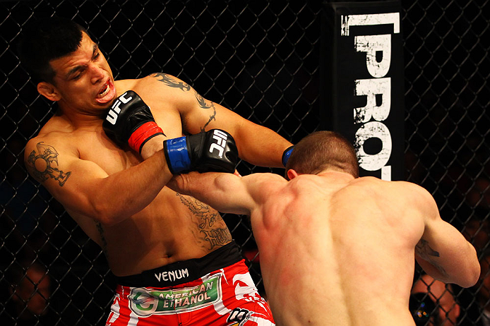 ATLANTA, GA - APRIL 21:  Mac Danzig (R) punches Efrain Escudero during their lightweight bout for UFC 145 at Philips Arena on April 21, 2012 in Atlanta, Georgia.  (Photo by Al Bello/Zuffa LLC/Zuffa LLC via Getty Images)