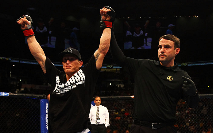 ATLANTA, GA - APRIL 21: Mac Danzig (L) celebrates defeating Efrain Escudero by unanimous decision during their lightweight bout for UFC 145 at Philips Arena on April 21, 2012 in Atlanta, Georgia. (Photo by Al Bello/Zuffa LLC/Zuffa LLC via Getty Images)