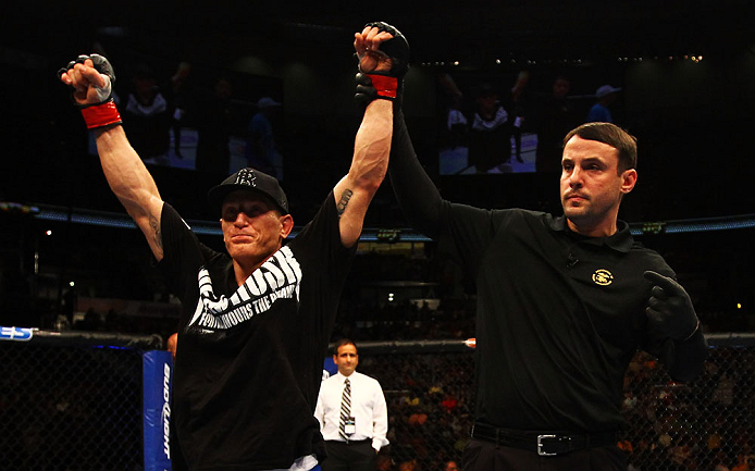 ATLANTA, GA - APRIL 21:  Mac Danzig (L) celebrates defeating Efrain Escudero by unanimous decision during their lightweight bout for UFC 145 at Philips Arena on April 21, 2012 in Atlanta, Georgia.  (Photo by Al Bello/Zuffa LLC/Zuffa LLC via Getty Images)