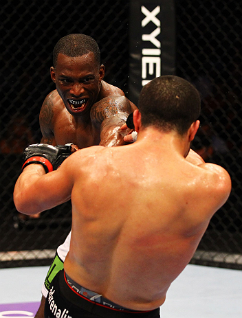 ATLANTA, GA - APRIL 21:  Anthony Njokuani (back) punches John Makdessi during their lightweight bout for UFC 145 at Philips Arena on April 21, 2012 in Atlanta, Georgia.  (Photo by Al Bello/Zuffa LLC/Zuffa LLC via Getty Images)