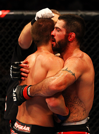 ATLANTA, GA - APRIL 21: Matt Brown (R) and Stephen Thompson embrace after their welterweight bout for UFC 145 at Philips Arena on April 21, 2012 in Atlanta, Georgia. (Photo by Al Bello/Zuffa LLC/Zuffa LLC via Getty Images)
