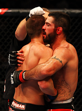 ATLANTA, GA - APRIL 21:  Matt Brown (R) and Stephen Thompson embrace after their welterweight bout for UFC 145 at Philips Arena on April 21, 2012 in Atlanta, Georgia.  (Photo by Al Bello/Zuffa LLC/Zuffa LLC via Getty Images)