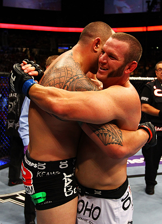 ATLANTA, GA - APRIL 21: Travis Browne (L) embraces Chad Griggs after defeating him by tap out in their heavyweight bout for UFC 145 at Philips Arena on April 21, 2012 in Atlanta, Georgia. (Photo by Al Bello/Zuffa LLC/Zuffa LLC via Getty Images)