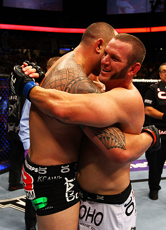 ATLANTA, GA - APRIL 21:  Travis Browne (L) embraces Chad Griggs after defeating him by tap out in their heavyweight bout for UFC 145 at Philips Arena on April 21, 2012 in Atlanta, Georgia.  (Photo by Al Bello/Zuffa LLC/Zuffa LLC via Getty Images)