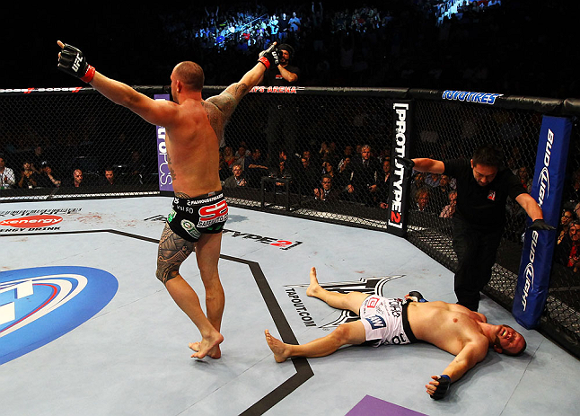 ATLANTA, GA - APRIL 21:  Travis Browne (L) celebrates after Chad Griggs (R) tapped out during their heavyweight bout for UFC 145 at Philips Arena on April 21, 2012 in Atlanta, Georgia.  (Photo by Al Bello/Zuffa LLC/Zuffa LLC via Getty Images)