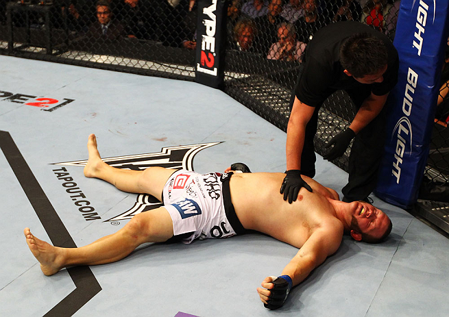 ATLANTA, GA - APRIL 21: Chad Griggs lays on the mat after tapping out during his heavyweight bout against Travis Browne for UFC 145 at Philips Arena on April 21, 2012 in Atlanta, Georgia. (Photo by Al Bello/Zuffa LLC/Zuffa LLC via Getty Images)