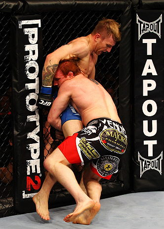 ATLANTA, GA - APRIL 21:  Mark Bocek (R) grapples with John Alessio during their lightweight bout for UFC 145 at Philips Arena on April 21, 2012 in Atlanta, Georgia.  (Photo by Al Bello/Zuffa LLC/Zuffa LLC via Getty Images)