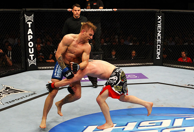 ATLANTA, GA - APRIL 21:  Mark Bocek (R) grapples with John Alessio during their lightweight bout for UFC 145 at Philips Arena on April 21, 2012 in Atlanta, Georgia.  (Photo by Al Bello/Zuffa LLC/Zuffa LLC via Getty Images)