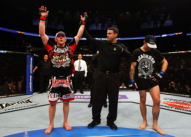 ATLANTA, GA - APRIL 21:  Mark Bocek (L) celebrates defeating John Alessio (R) by unanimous decision during their lightweight bout for UFC 145 at Philips Arena on April 21, 2012 in Atlanta, Georgia.  (Photo by Al Bello/Zuffa LLC/Zuffa LLC via Getty Images)