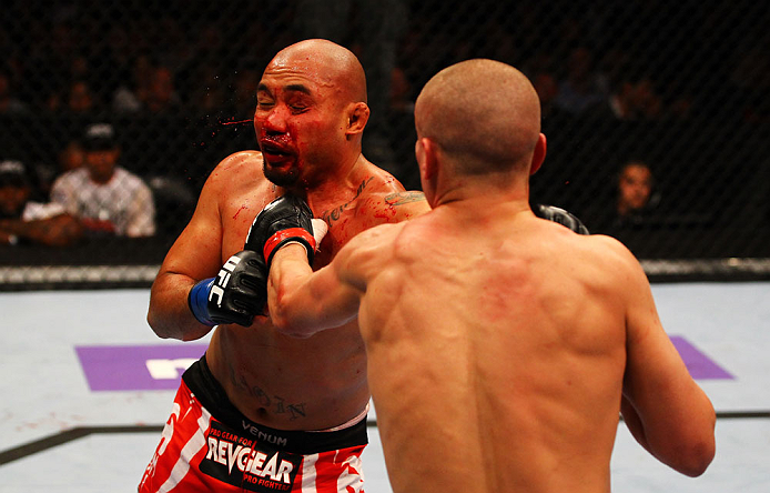 ATLANTA, GA - APRIL 21: Mark Hominick (R) punches Eddie Yagin during their featherweight bout for UFC 145 at Philips Arena on April 21, 2012 in Atlanta, Georgia. (Photo by Al Bello/Zuffa LLC/Zuffa LLC via Getty Images)