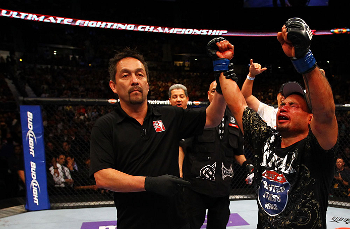 ATLANTA, GA - APRIL 21:  Eddie Yagin (R) celebrates defeating Mark Hominick (not pictured during their featherweight bout for UFC 145 at Philips Arena on April 21, 2012 in Atlanta, Georgia.  (Photo by Al Bello/Zuffa LLC/Zuffa LLC via Getty Images)