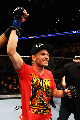 ATLANTA, GA - APRIL 21:  Michael McDonald celebrates defeating Miguel Angel Torres by knockout in the first round during their Bantamweight bout for UFC 145 at Philips Arena on April 21, 2012 in Atlanta, Georgia.  (Photo by Al Bello/Zuffa LLC/Zuffa LLC vi