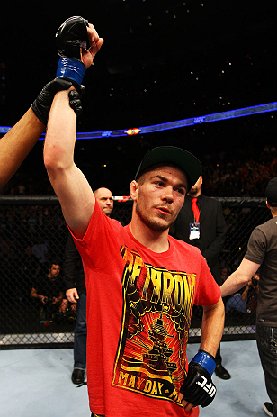 ATLANTA, GA - APRIL 21: Michael McDonald celebrates defeating Miguel Angel Torres by knockout in the first round during their Bantamweight bout for UFC 145 at Philips Arena on April 21, 2012 in Atlanta, Georgia. (Photo by Al Bello/Zuffa LLC/Zuffa LLC vi