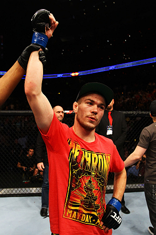 ATLANTA, GA - APRIL 21:  Michael McDonald celebrates defeating Miguel Angel Torres by knockout in the first round during their Bantamweight bout for UFC 145 at Philips Arena on April 21, 2012 in Atlanta, Georgia.  (Photo by Al Bello/Zuffa LLC/Zuffa LLC vi