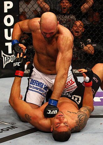 ATLANTA, GA - APRIL 21: Ben Rothwell (top) punches Brendan Schaub during their heavyweight bout for UFC 145 at Philips Arena on April 21, 2012 in Atlanta, Georgia. (Photo by Al Bello/Zuffa LLC/Zuffa LLC via Getty Images)