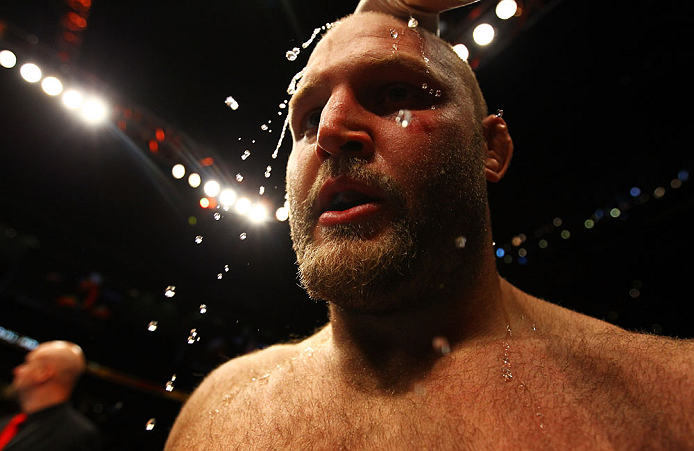 ATLANTA, GA - APRIL 21:  Water is applied to Ben Rothwell's head after he defeated Brendan Schaub by TKO in the first round of their heavyweight bout for UFC 145 at Philips Arena on April 21, 2012 in Atlanta, Georgia.  (Photo by Al Bello/Zuffa LLC/Zuffa L