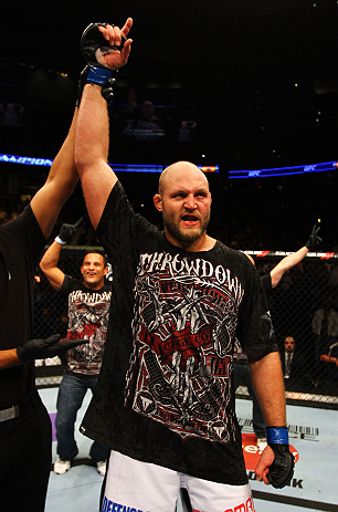 ATLANTA, GA - APRIL 21: Ben Rothwell celebrates his TKO victory over Brendan Schaub after their heavyweight bout for UFC 145 at Philips Arena on April 21, 2012 in Atlanta, Georgia. (Photo by Al Bello/Zuffa LLC/Zuffa LLC via Getty Images)