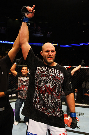 ATLANTA, GA - APRIL 21:  Ben Rothwell celebrates his TKO victory over Brendan Schaub after their heavyweight bout for UFC 145 at Philips Arena on April 21, 2012 in Atlanta, Georgia.  (Photo by Al Bello/Zuffa LLC/Zuffa LLC via Getty Images)