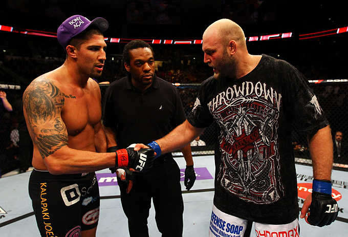 ATLANTA, GA - APRIL 21:  Brendan Schaub (L) shakes hands with Ben Rothwell after Rothwell defeated him by TKO in their heavyweight bout for UFC 145 at Philips Arena on April 21, 2012 in Atlanta, Georgia.  (Photo by Al Bello/Zuffa LLC/Zuffa LLC via Getty I